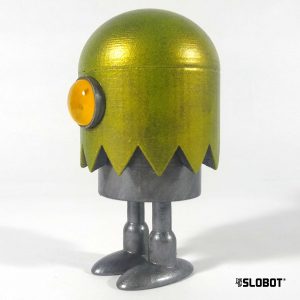 Slo-Ghost by Mike Slobot in metallic green. A robot hiding in a Ghost costume. Video Games and arcades