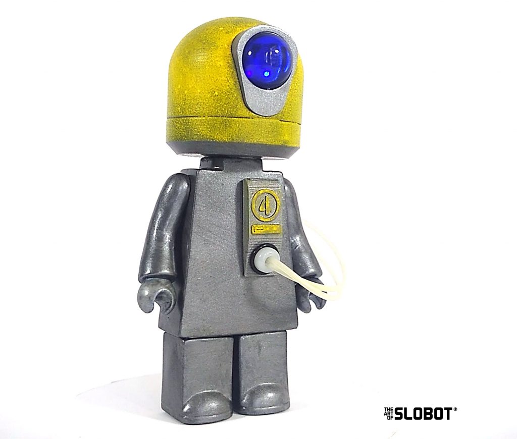 This is TekFour by Mike Slobot. A multi-talented repair robot from the distant past.